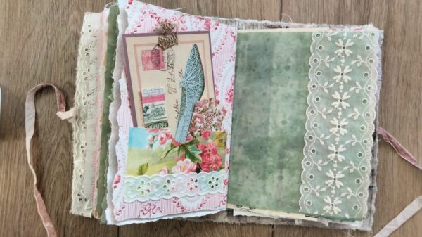 Journal spread with pocket and lace detail