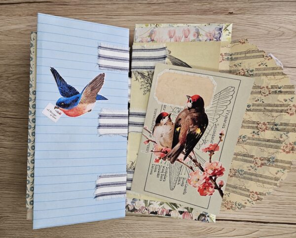 Journal spread with pair of birds