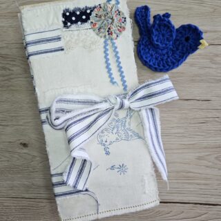 Junk journal cover with blue and white stripe ribbon