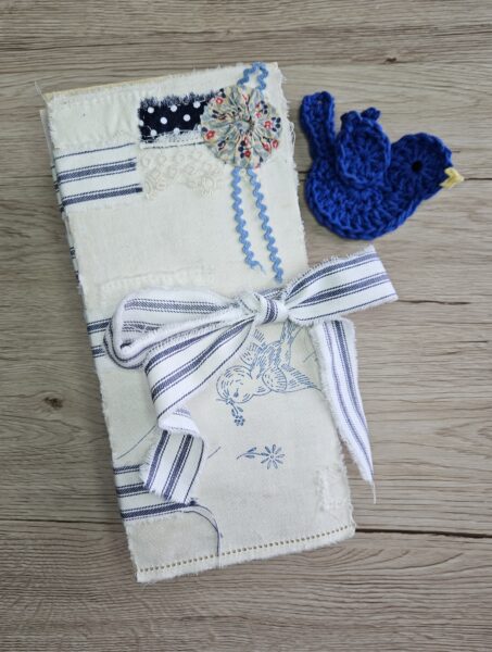 Junk journal cover with blue and white stripe ribbon