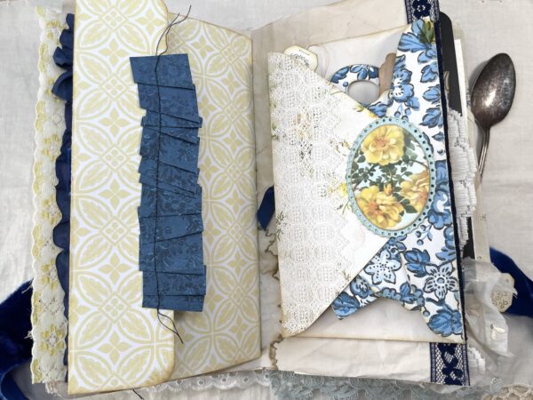 Journal page with envelope pocket with yellow flower sticker