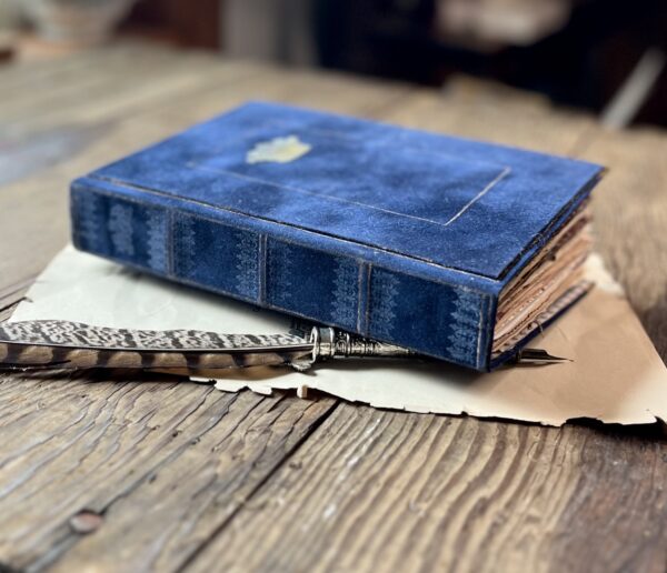 Side view of blue junk journal