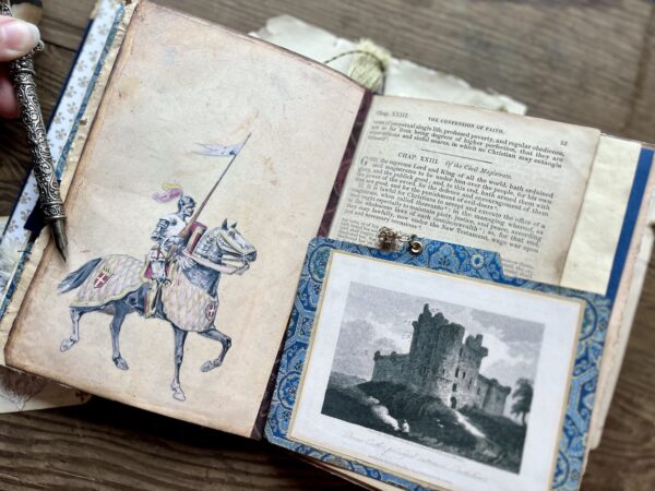 Journal spread with a knight on a horse