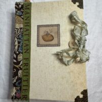 Junk journal cover with green spine and ribbon