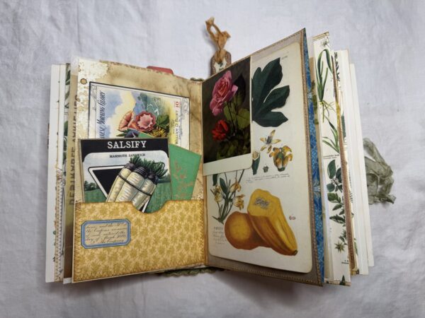 Journal spread with pocket filled with flower images