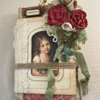 Junk journal cover with woman portrait and fabric red rose bunch