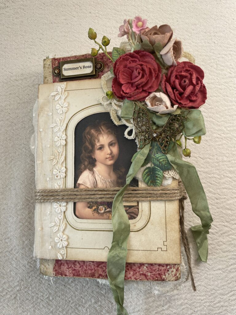 Junk journal cover with woman portrait and fabric red rose bunch