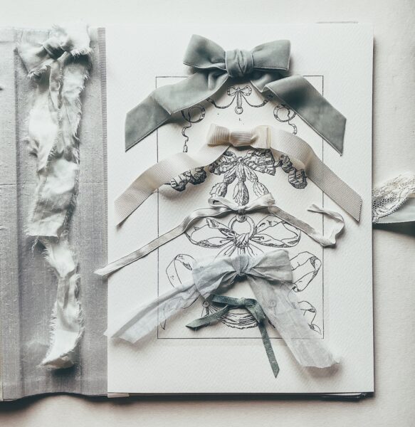 Journal page with fabric bows attached