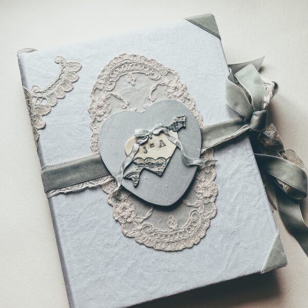 Journal cover with porcelain heart charm