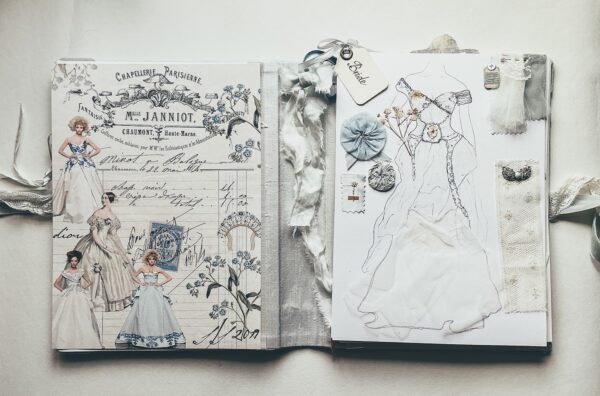 Journal spread with keepsakes attached