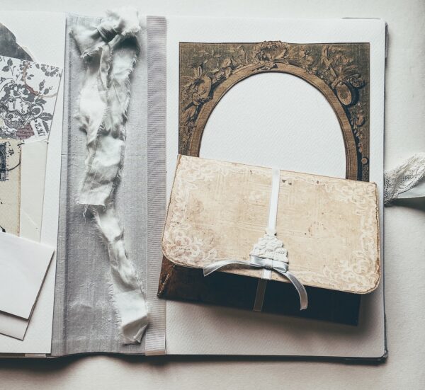 Journal spread with oval picture frame