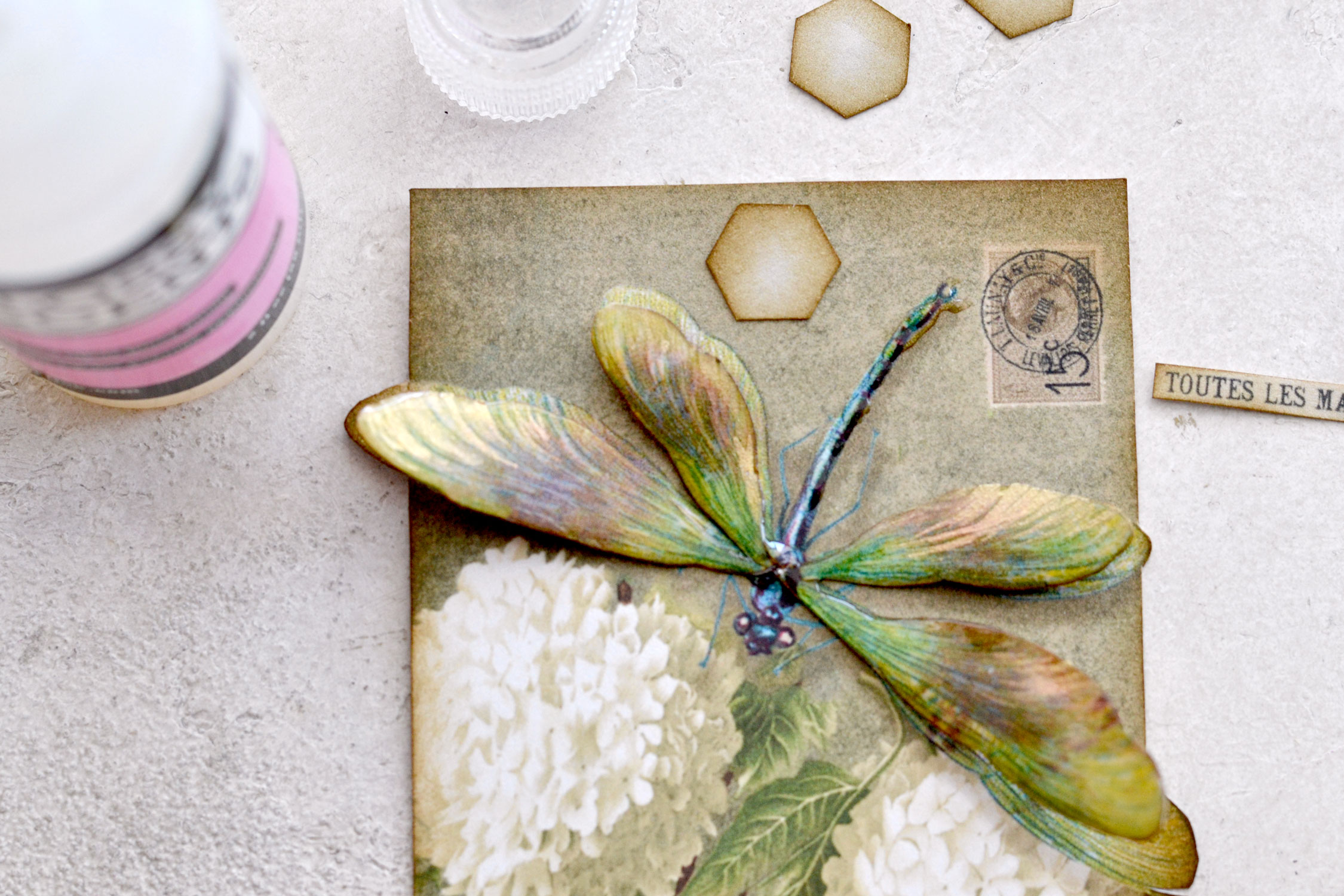 gluing the reinforcers and the wings