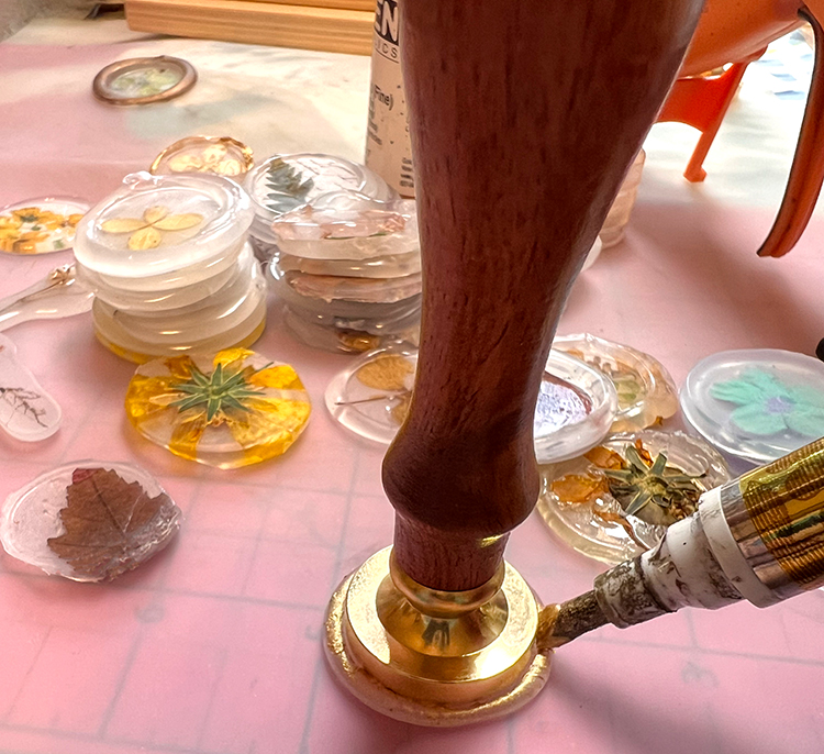 Painting seal edges with stamp in place
