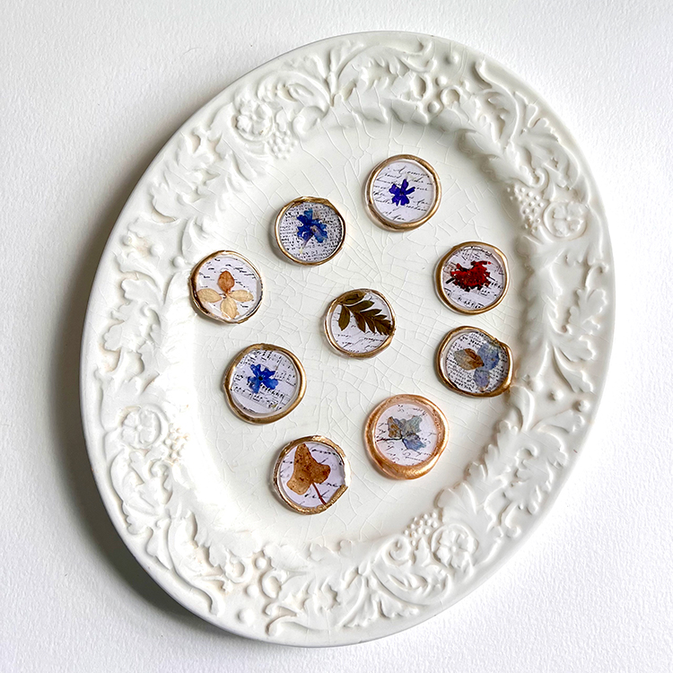 paper wax seals on plate