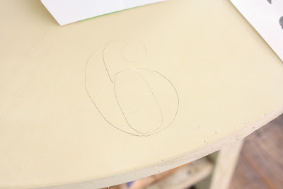 Number traced onto wood